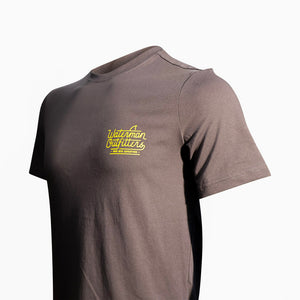 Gray t-shirt with yellow logo on a white background