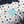 Fabric with tropical pattern and 'WO' logo