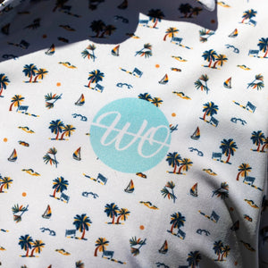 Fabric with tropical pattern and 'WO' logo