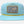 Light blue cap with a decorative patch on a white background