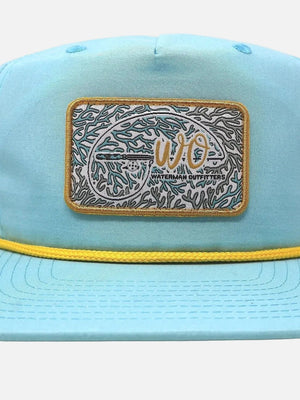 Light blue cap with a decorative patch on a white background