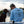 Man and dog on a dock wearing a 'Waterman Outfitters' shirt