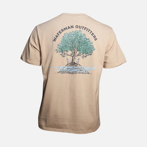 Beige t-shirt with a mangrove tree graphic and 'Waterman Outfitters' text on a white background