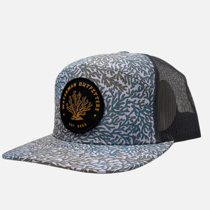 Trucker hat with coral pattern and logo on a white background